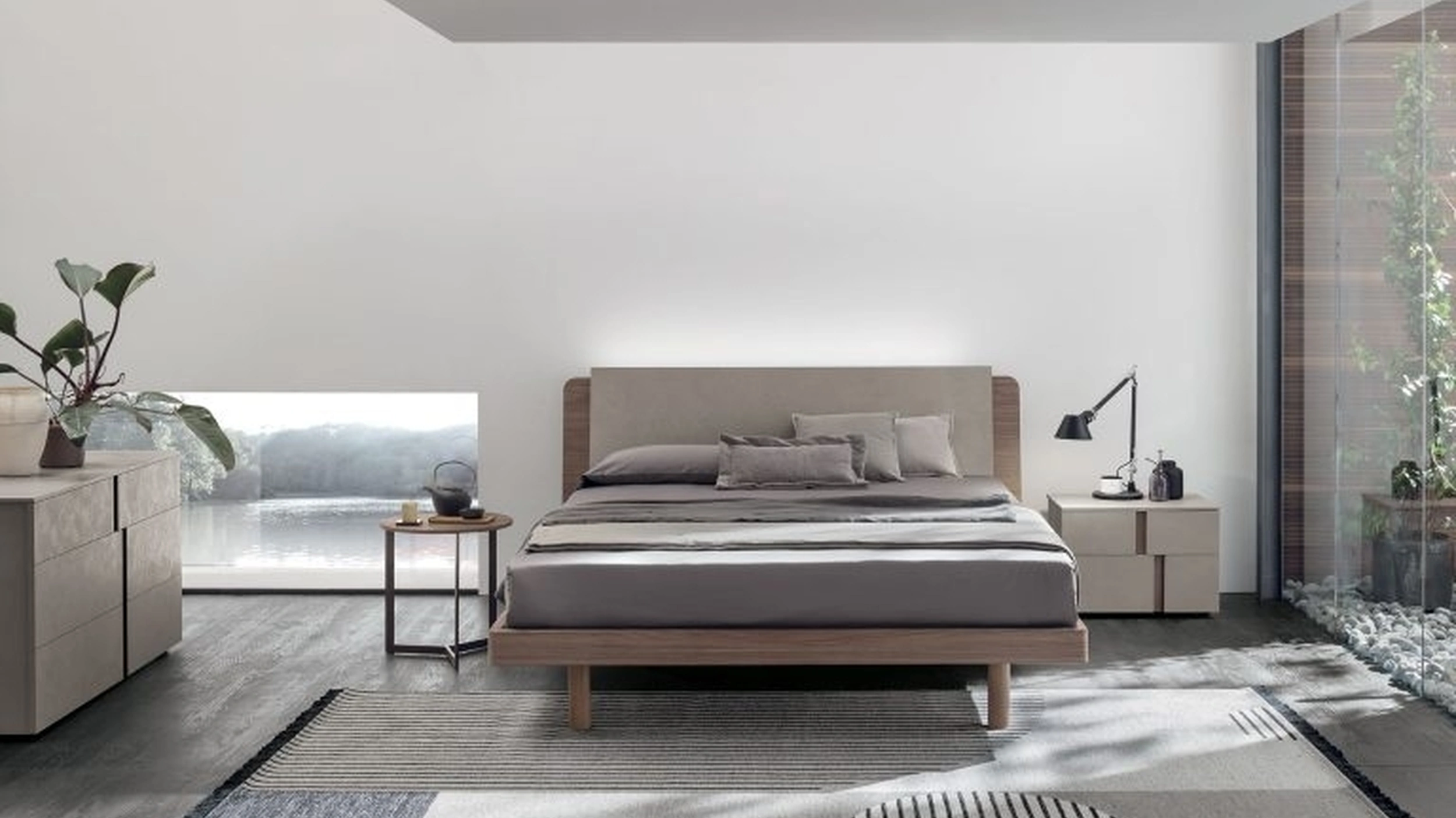 Letto in materico noce ambra e materico cemento cava con testiera Roxy di Tomasella